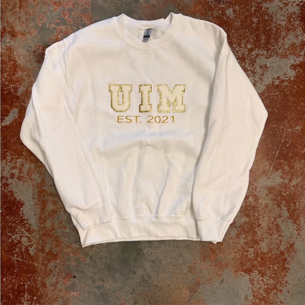 White UIM pageant sweatshirt